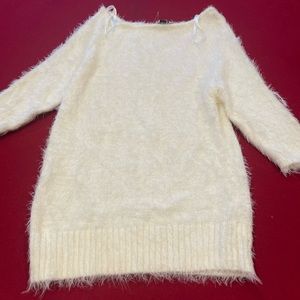 Bebe White sweater very smooth.